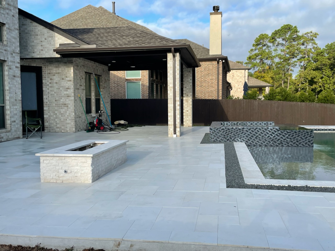 Compact Backyard Pool with Hardscape